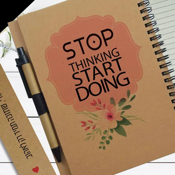 מחברת העצמה אישית בתוספת שם, עם משפט: Stop Thinking Start Doing