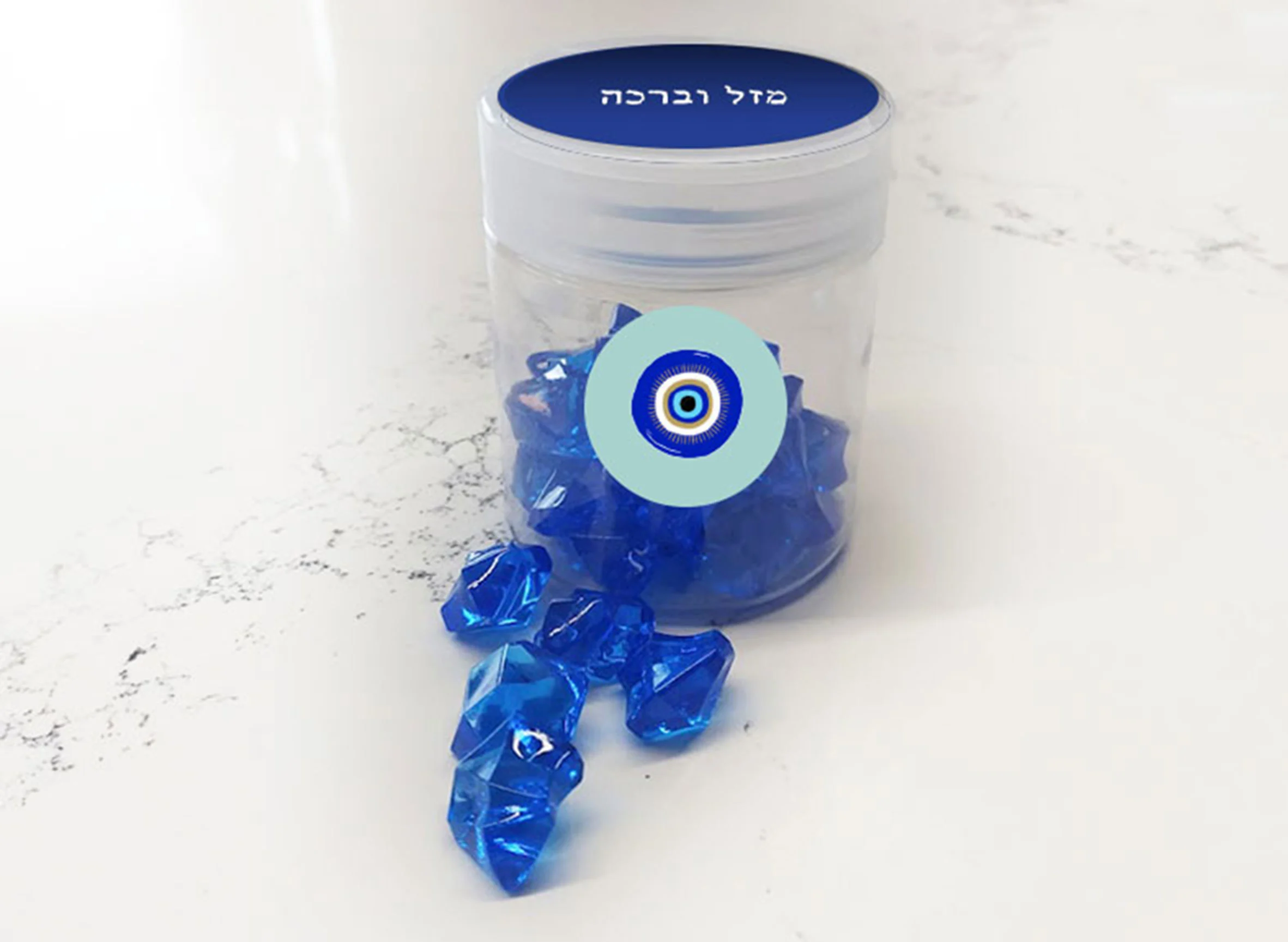 צנצנת ל״מזל וברכה״ עם אבנים כחולות
